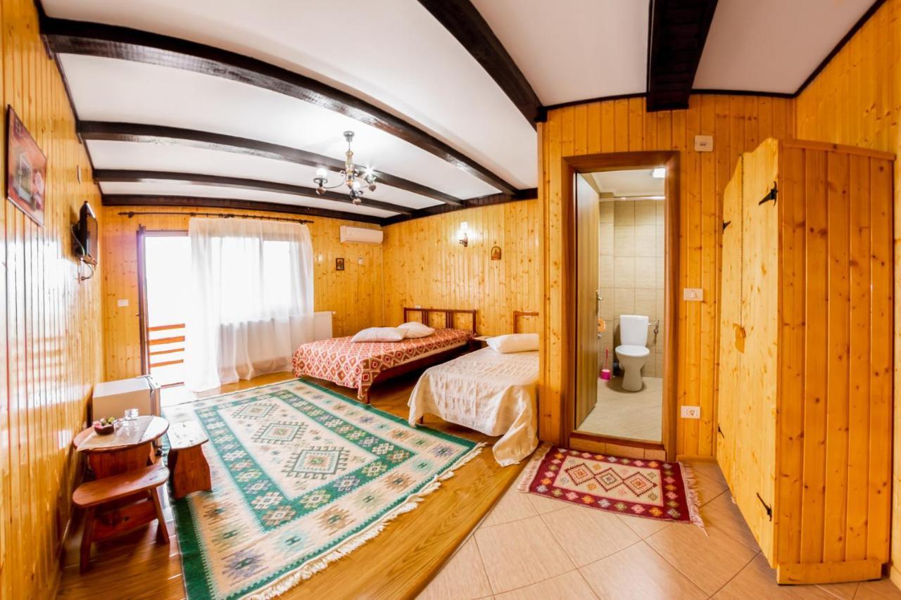 Pensiunea La Maria Lu' Sandoiu Hotel Poenari Buitenkant foto