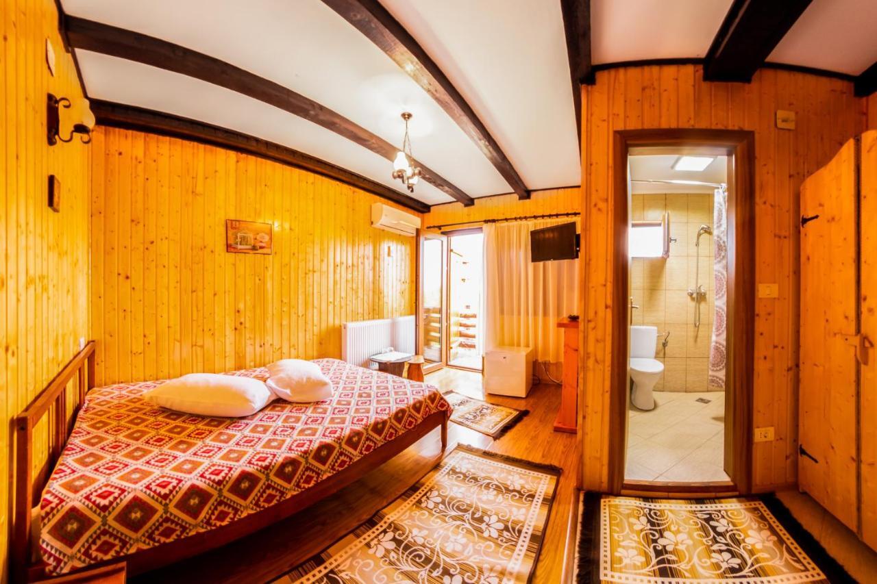 Pensiunea La Maria Lu' Sandoiu Hotel Poenari Buitenkant foto