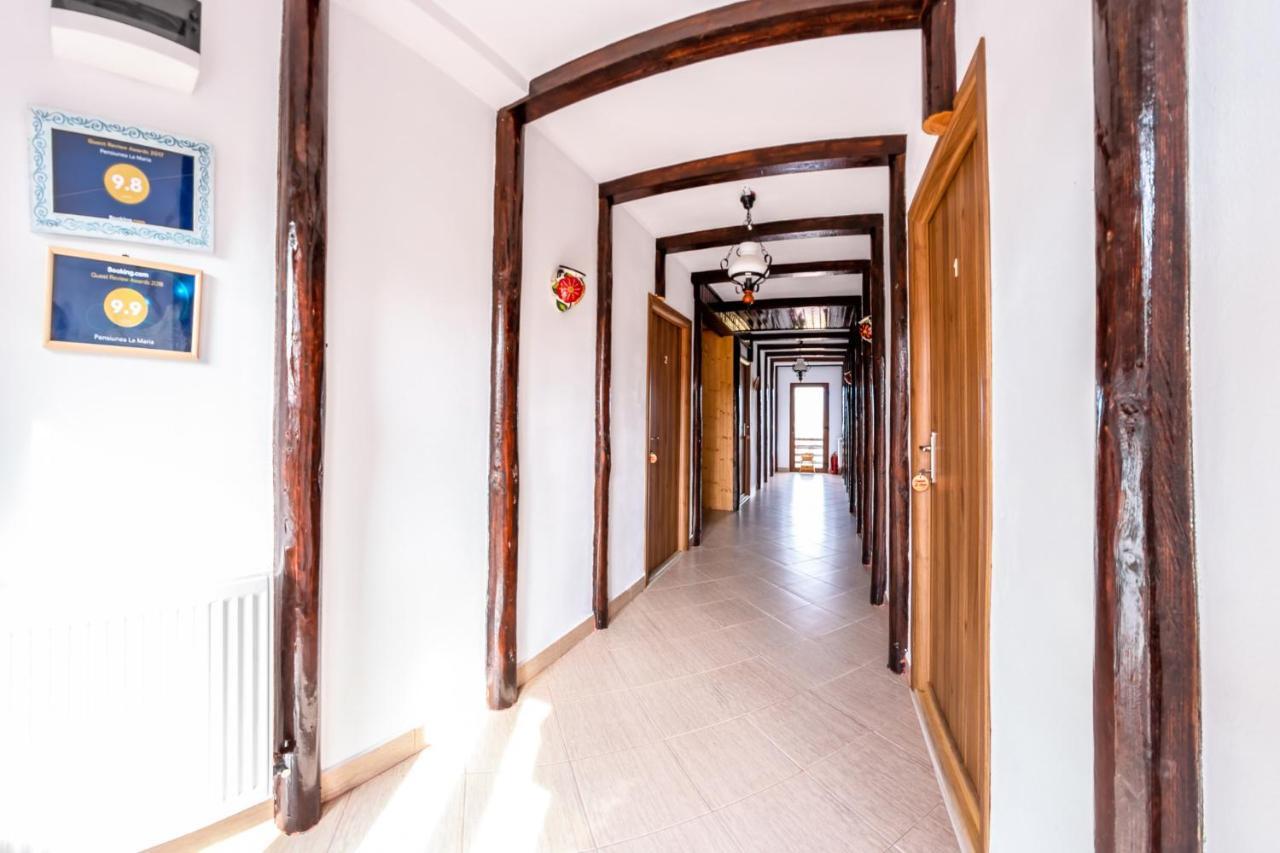 Pensiunea La Maria Lu' Sandoiu Hotel Poenari Buitenkant foto